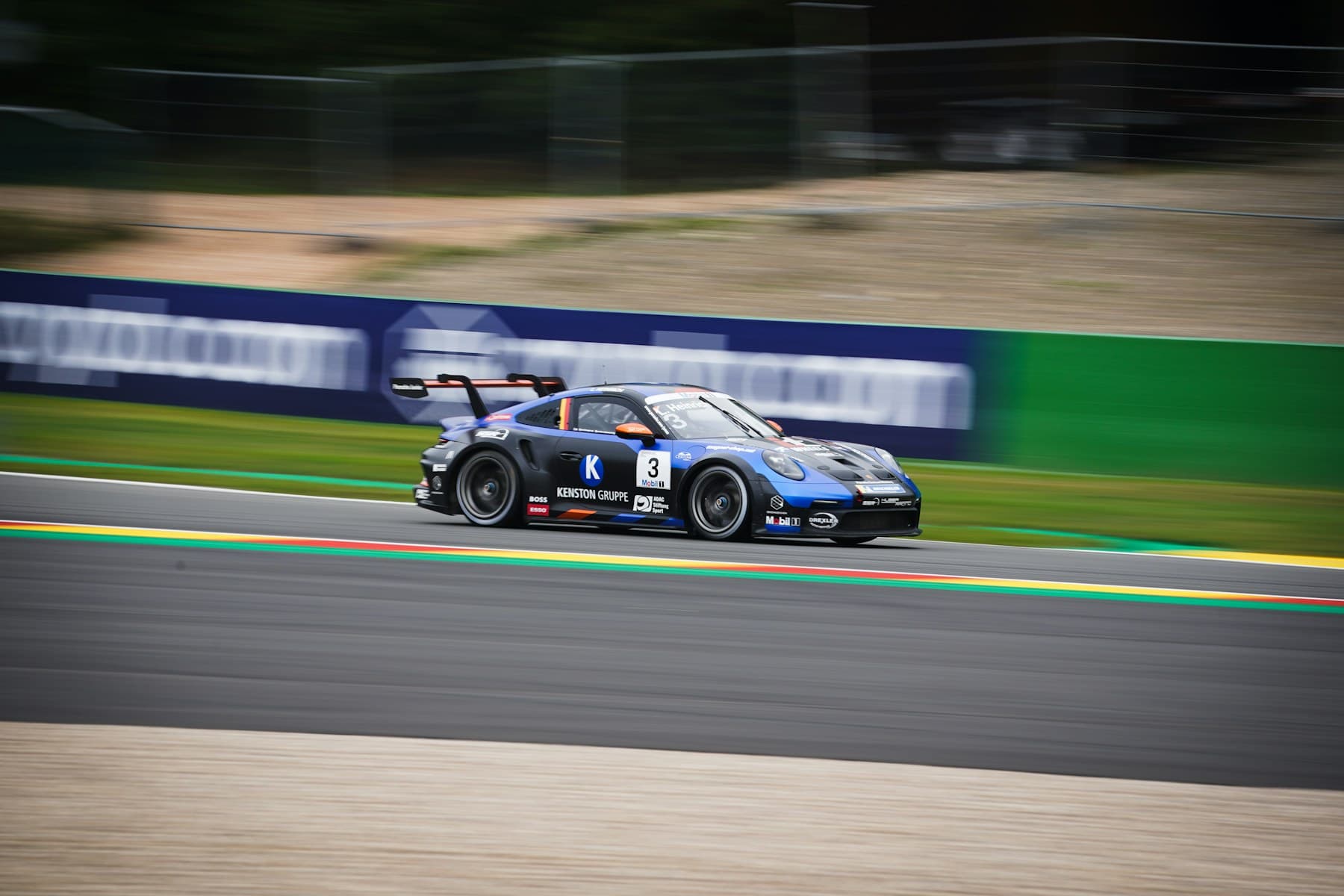 Professional motorsport circuit at dusk